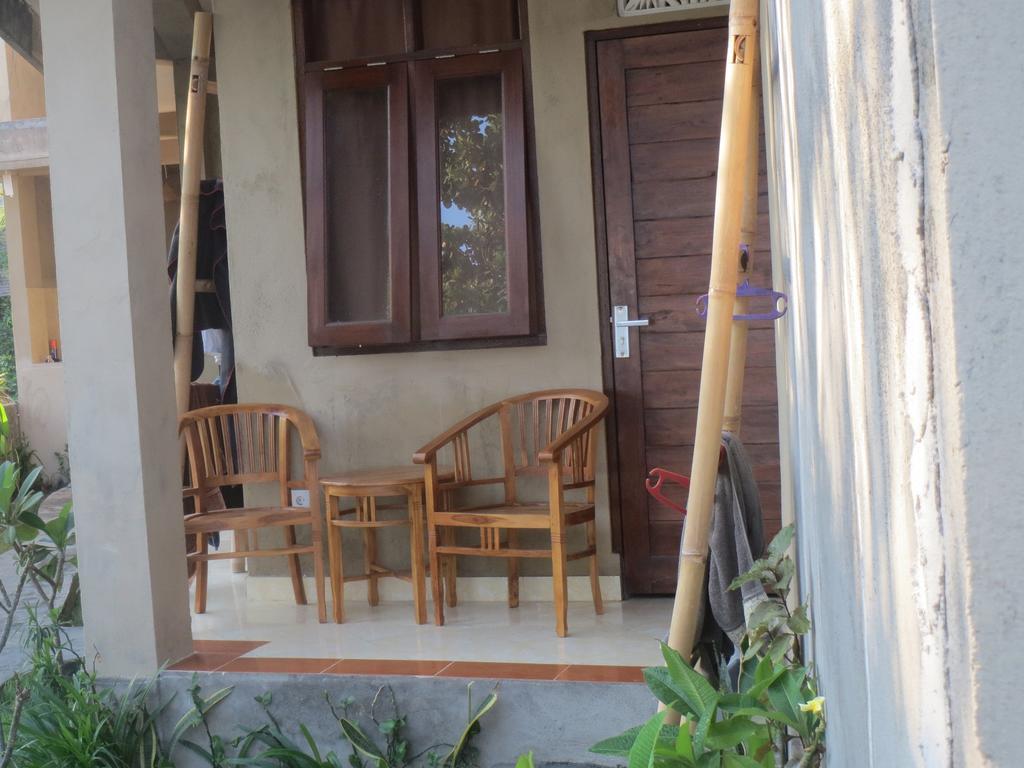 Amed Sari Beach Guesthouse Pokoj fotografie