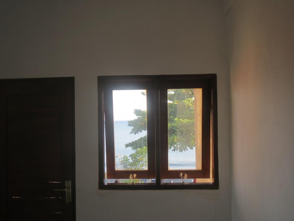 Amed Sari Beach Guesthouse Pokoj fotografie