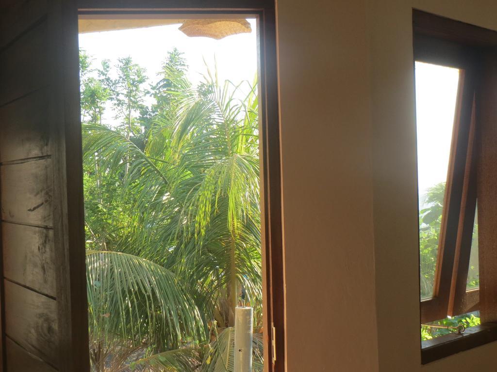 Amed Sari Beach Guesthouse Pokoj fotografie